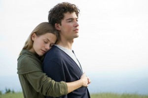 Couple-embracing-outdoors